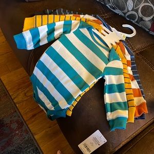 BRAND NEW 4 PACK OF LONG SLEEVE BODYSUITS